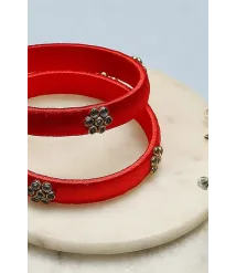 Red Plastic & Thread Bangles Red Plastic & Thread Bangles
